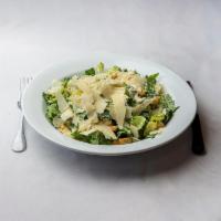 Caesar Salad · Romaine lettuce, shaved Parmesan and croutons.