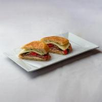 The Big Daddy Panini · Grilled chicken, prosciutto, roasted peppers, grilled eggplant, provolone cheese and pesto m...