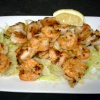 Wally's Grilled Shrimp · Succulent shrimp grilled with fresh garlic and sliced scallions.
