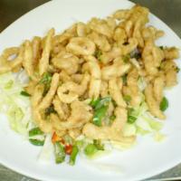 Chinese Fried Calamari · Intensely seasoned with salt, fresh Thai chili peppers, garlic and onions.