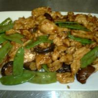 Chicken with Chinese Snow Peas · Crisp garden fresh snow peas stir-fried with sliced chicken breast and Chinese black mushroo...
