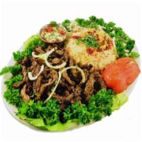 Beef Shawarma Entree · Marinated tender beef, perfectly grilled, shredded and served with tahini sauce. Served with...