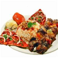 Lamb Kabob Entree  · Tender lamb chunks marinated and grilled with bell peppers and onions. Served with hummus, g...