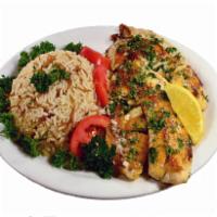 Fish Entree · Two filets of tilapia grilled and topped with a lemon garlic sauce. Served with hummus, gard...