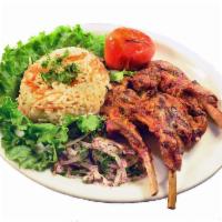 Lamb Chops · Three lamb chops marinated in olive oil, herbs and spices. Cooked to a tender delight. Serve...