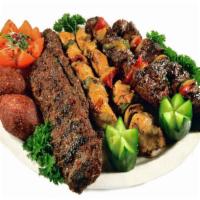 Red Moon Feast for Four · Red Moon Fou for 4 includes: two Beef kabob skewers, two chicken kabob skewers and two kafta...