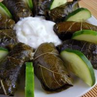Dolma · Grape leaves stuffed with rice, currants and herbs.