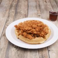 Chicken and Waffles · Belgian waffle topped with crispy chicken tenders with house blend syrup.
Add bacon for an a...