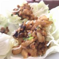 Chicken Soothing Lettuce Wrap and Crispy Rice Noodle · Ground chicken pan-seared with ginger, scallions, water chestnuts, crush hot pepper and shii...