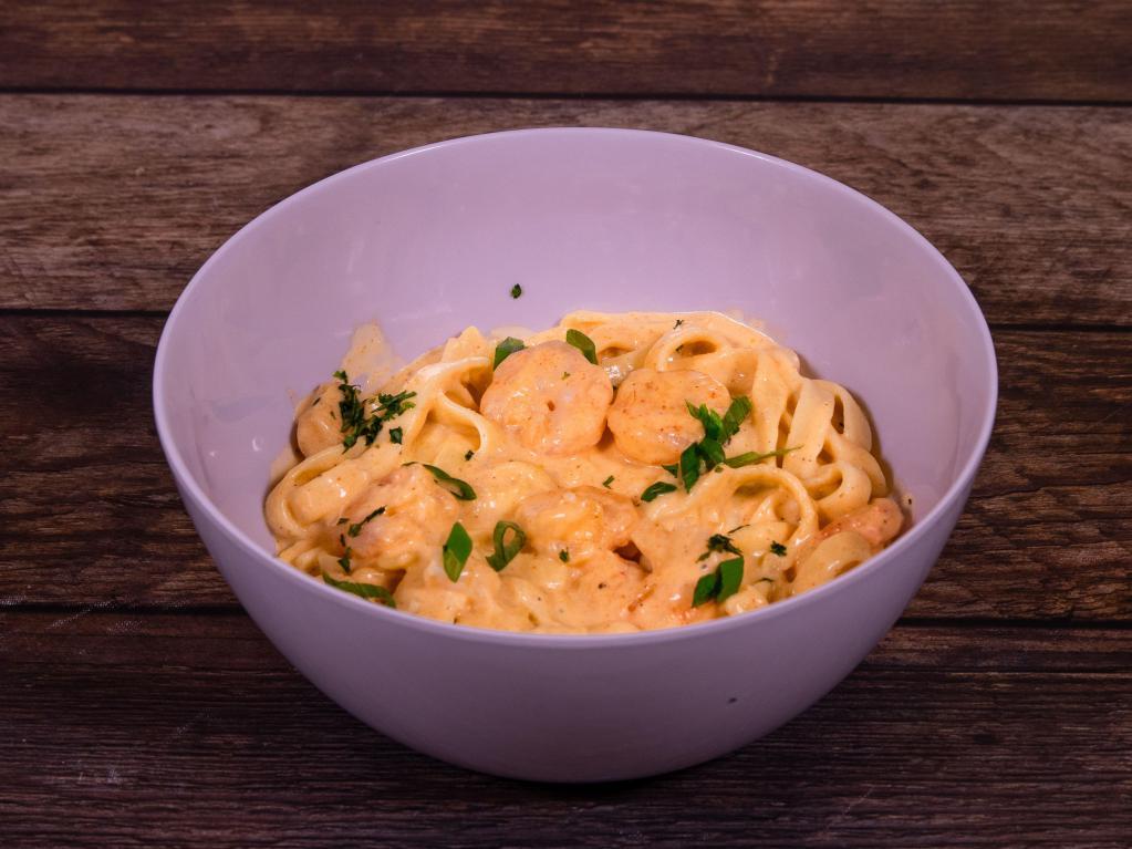 Shrimp Pasta Alfredo · Sauteed gulf shrimp tossed with our homemade Alfredo sauce with penne noodles.