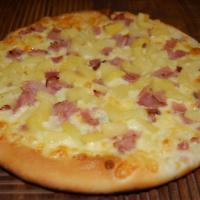 Hawaiian Delight Pizza · This pizza has no sauce and toppings of cheese, ham and pineapple and all on top of our deli...