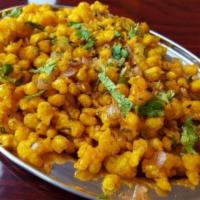 Masala Pepper Corn · Baby corn marinated in crushed pepper corns fried with chopped onions and sauteed to perfect...