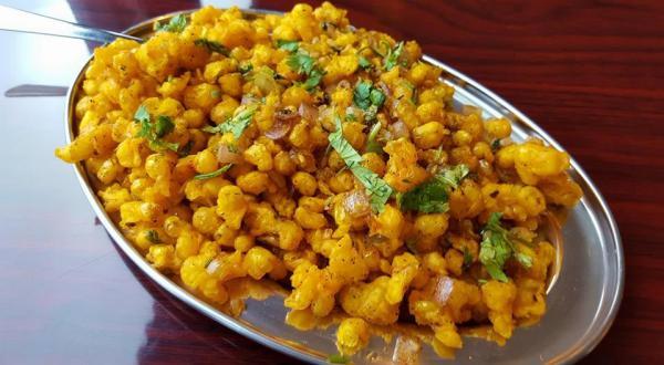 Masala Pepper Corn · Baby corn marinated in crushed pepper corns fried with chopped onions and sauteed to perfection. Vegetarian.