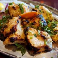 Chicken Malai Kabab · 6 pieces. Boneless chicken marinated with cream and spices.