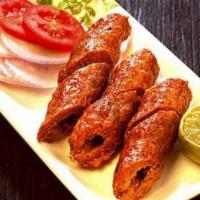 Seekh Kababs · Ground Lamb or Chicken mixed with spices skewered and cooked in Tandoor