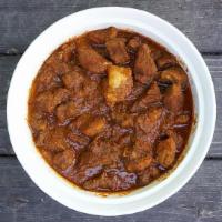 Chicken Vindaloo · Traditionally cooked chicken with vinegar and potatoes, extremely hot.
