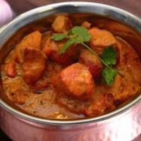 Chicken Kadai · Tender meat cooked slowly with ginger, tomato, onion, green chilies and fresh coriander.