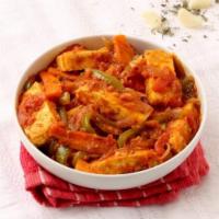 Chicken Jelferzi · Delicately meat cooked with onion, bell pepper, tomato in tomato sauce.
