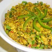 Paneer Bhurji · Grated paneer tossed with fresh onion or tomato in Indian spice.