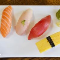 Ceetay Sushi Sampler · Tuna, yellowtail, salmon, striped bass, tamago and oven baked crab.