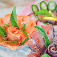 Sashimi Martini · Choose Salmon, Tuna, or Yellowtail
	
Salmon: mint, sriracha, scallion, ponzu, sesame seed
Tu...