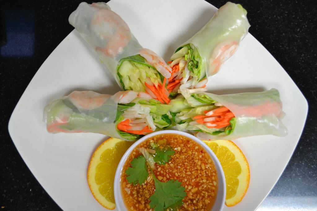 12. 2 Spring Rolls · Lettuce, carrots, bean sprouts, cucumber, rice noodles, mint and shrimp in a rice paper wrap, hand rolled and served with sweet and sour sauce with ground peanuts.