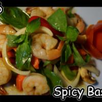 60. Spicy Basil · Chili, garlic, mushroom, carrot, onion, bell pepper and basil leaves. Spicy.