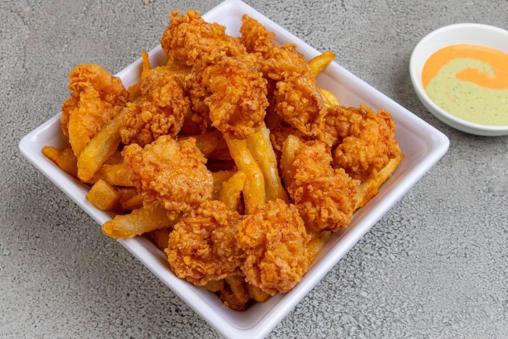 Chicharron de Camarones · Crispy bites of shrimps served with Peruvian yellow potato fries.