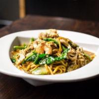 Nabon Noodles · Egg noodles, chicken, and shrimp with Chinese broccoli, egg, and black soy sauce.