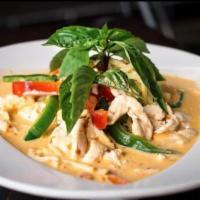 Red Curry · Spicy, little salty curry with bamboo shoots and basil. Spicy.