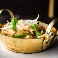 Pattaya Noodle · Broad rice noodles with tofu, radish, scallions, bean sprouts, and sesame oil. Vegetarian. V...