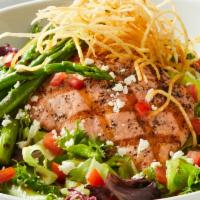 Grilled Salmon Salad* · Salmon, field greens, tomatoes, grilled asparagus, feta, crispy shoestring potatoes, balsami...