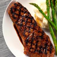 New York Strip* · 14 oz aged, grilled asparagus, mashed potatoes
