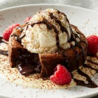 Warm Chocolate Cake · Molten chocolate cake, anglaise and vanilla gelato