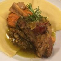 Hugo Crepe · Slow-braised saffron lamb shank, richly flavored with shallots, fresh herbs and gourmet ras ...