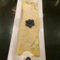 Blueberry Farms · Yummy house made blueberry compote with sweet cheese, in a crepe topped with fresh blueberri...