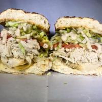 30. Backstabber Sandwich · Halal chicken, artichoke hearts, Caesar dressing and provolone cheese.