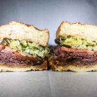 242. Phil'er Up KC BBQ Sandwich · Roast beef, BBQ sauce and cheddar cheese.