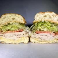 68. Chase Ottney is Hella Sexy Sandwich · Turkey and provolone. Served with dirty sauce, lettuce and tomato.