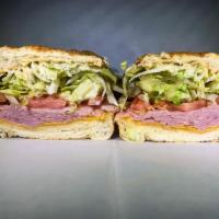 129. Randy Hahn Sandwich · Ham and cheddar. Served with dirty sauce, lettuce and tomato.