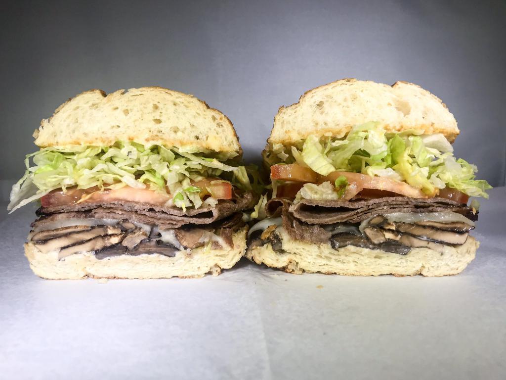 2. Hollywould SF Cheezesteak Sandwich · Thinly sliced rib eye steak, grilled mushrooms and provolone.