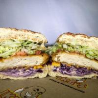 139. Anchorman Sandwich · Fried chicken, homemade poppy seed coleslaw and American cheese.