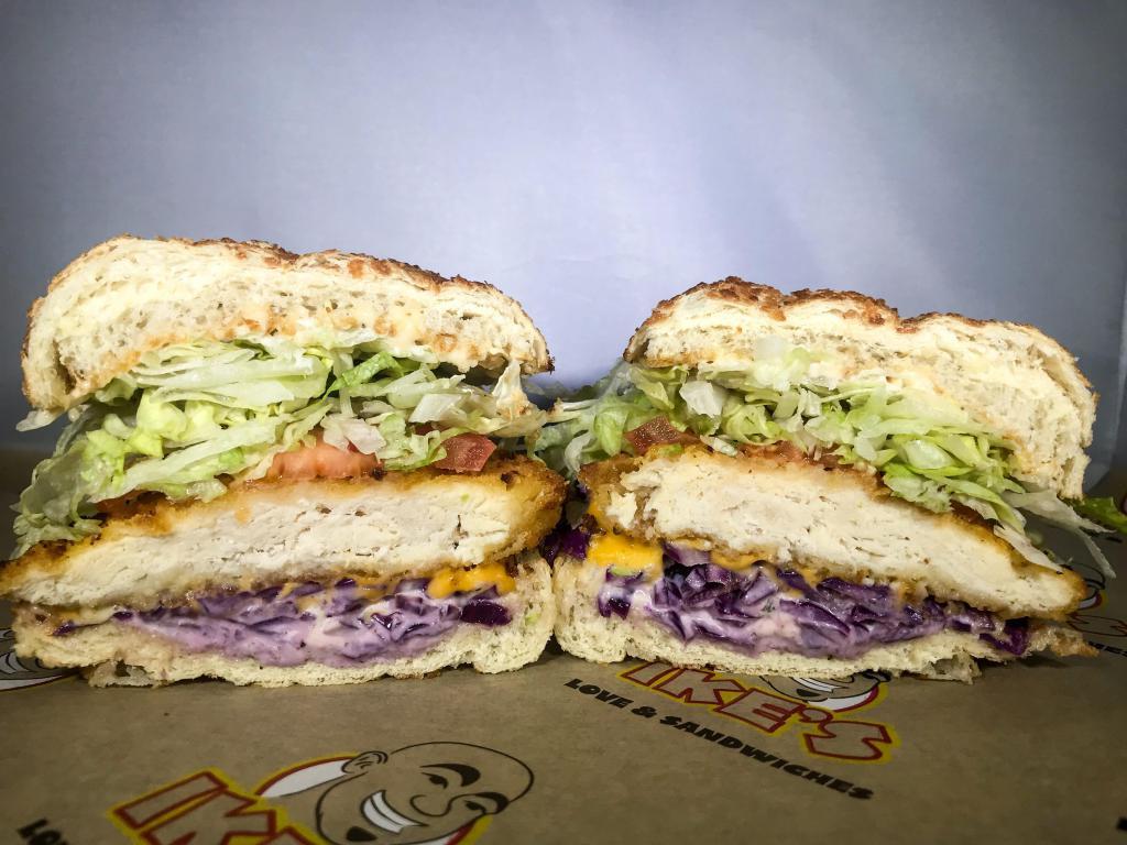 139. Anchorman Sandwich · Fried chicken, homemade poppy seed coleslaw and American cheese.