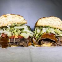 240. Madison Bumgarner Sandwich · Steak, Ike's yellow BBQ, Sriracha, pepper jack, and American. Served with dirty sauce, lettu...