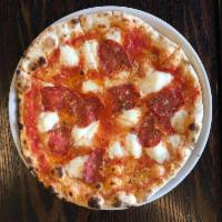 Pizza Salamino Piccante (Spicy Salami) · Your choice of pizza crust served with our signature red sauce, mozzarella (Mozzarella Fiord...