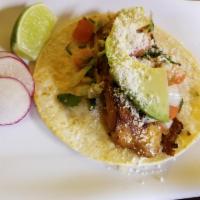 Grilled Fish Taco · Topped with pico de gallo, avocado and cotija cheese. Tacos topped with fresh onions and cil...