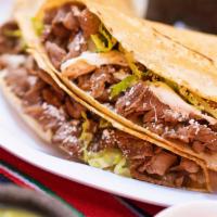 2 Quesadillas · Warm grilled flour or corn tortilla filled with white Mexican cheese fresh lettuce and cotij...