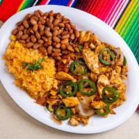 Pollo a la Mexicana Platillo · Grilled white meat chicken, sauteed with onions, tomatoes and jalapeno pepeprs. Served with ...
