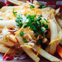 8. Garlic Cheese Fries · French fries with cheddar cheese, garlic and parsley.