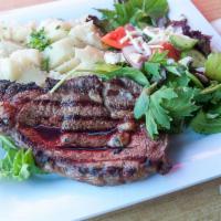 12 oz. Ribeye · With small mixed greens.